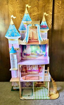 KidKraft “Disney Princess Royal Celebration Wooden Dollhouse