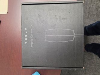 Tesla Mobile Connector Gen 3. New with nema 14-50 adapter