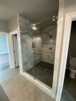 Frameless shower doors