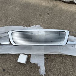 Ford f150 grill 01-04 ( new truck parts )