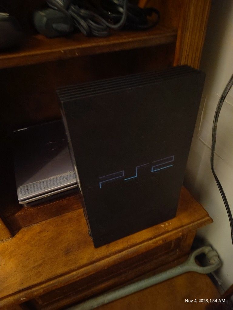 PS2 No Controllers. ** Only Power Cord Comes With It** $20