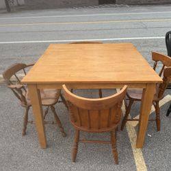 Square Wooden Table With 4 Wooden Chairs  TABLE  42” wide  42” deep  31” tall  CHAIRS  18” wide  16” deep  18” floor to seat  30” tall in back 