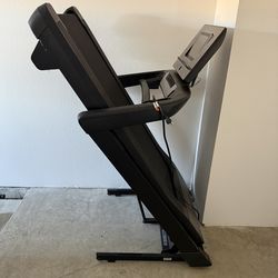 Nordic Track EXP 10i foldable treadmill with adjustable incline.