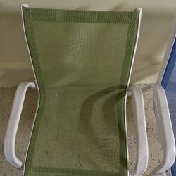 A pair of iron kids chairs