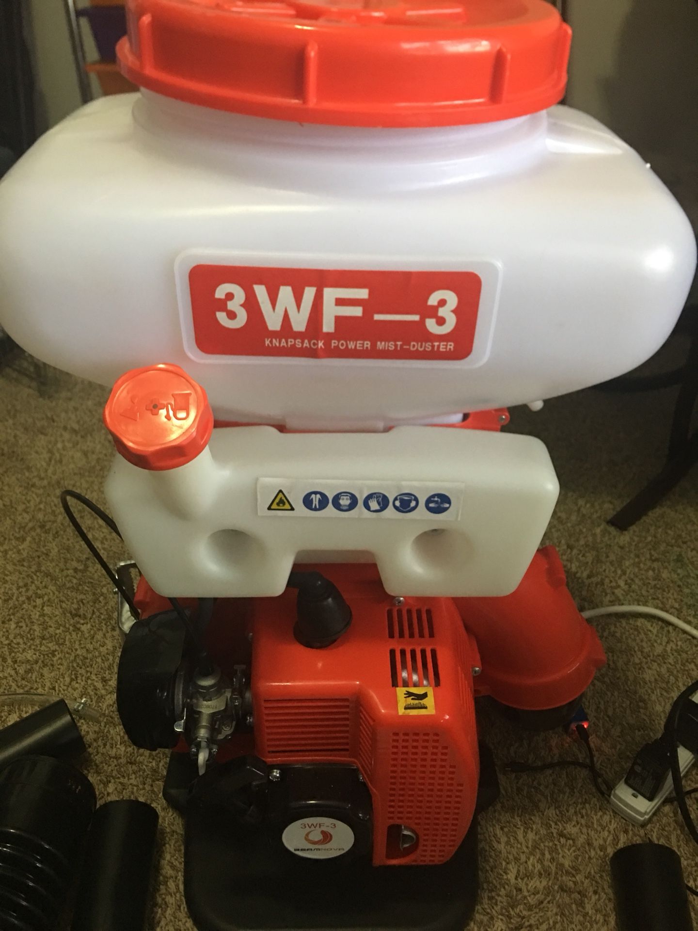 Duster backpack sprayer. Farm.
