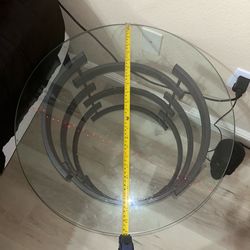 Three glass tables