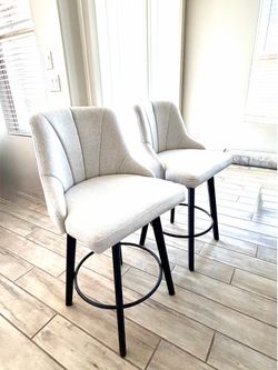 Set of 2 Swivel counter stools.