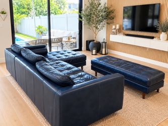 Dark Blue Leather Sectional Sofa + Matching Ottoman – $800