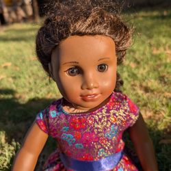 American Girl Truly Me 18” Doll – Brown Eyes, Curly Dark Brown Hair, Medium-Dark Skin Tone – Purple Floral Dress