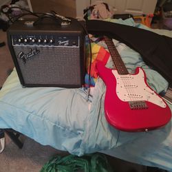 Squier Electric Guitar With Fender Frontman 20g Amp