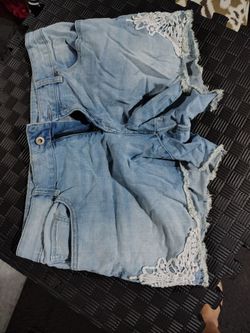 Stretchy jeans shorts with lace trim size 12
