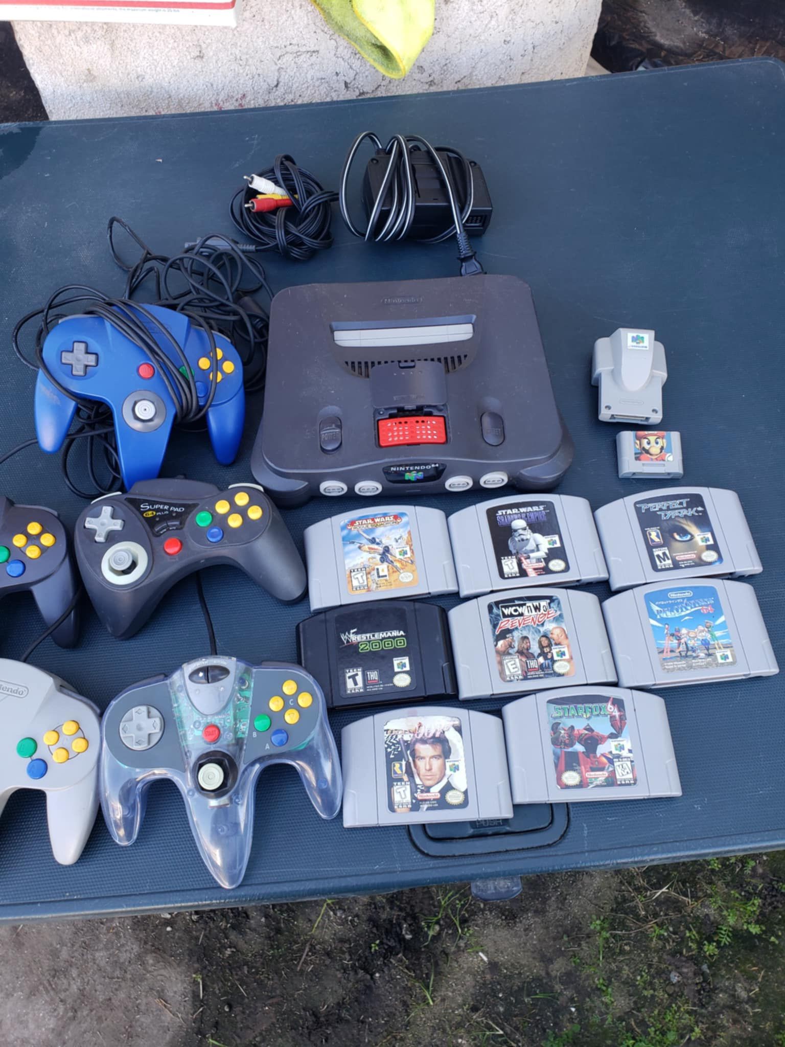 2 memory Cards. 1 Red Graphics Card. 8 Great Games N64 Original. & 5 Controllers. With Nintendo N 64 All $350! Firm or Trade Are welcome