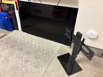 Roku 65 inch 4K TV with stand