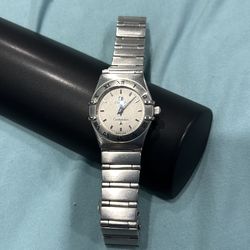 Woman white constellation omega watch