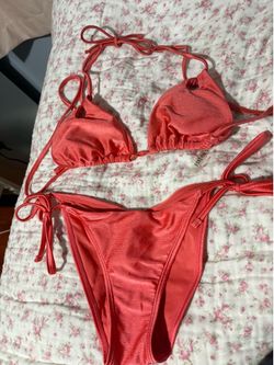 Pinkish-orange bathing suit