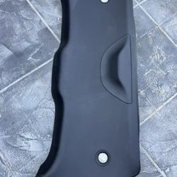 Original OEM interior lower trim panel for the tailgate.