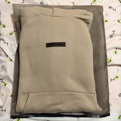 Fear of God Essential Hoodie (2), TIMBER and ABBEY STONE, Small, Authentic SS25 with CertiLogo QR code.