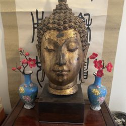 old asian bronze buddha head with stand