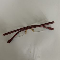 Frameless glasses with sheet metal temples