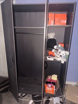 Dark brown wardrobe closet