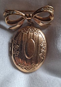 Antique Gold-Tone Bow Brooch with Locket Pendant