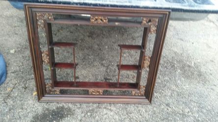 Picture frame with shelves