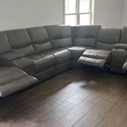 Spring Blowout Sale. Madrid Gray Leather Reclining Sectional Now $1199. Easy Finance Option. Same-Day Delivery.