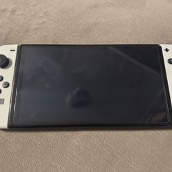 Nintendo Switch OLED (white) w Mario Color Joy-cons & Carrying Case