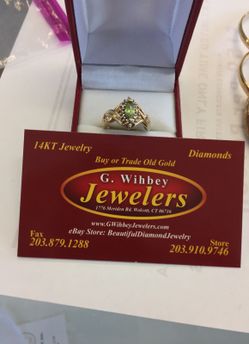 14 Kt real gold , diamonds& Peridot ( August)