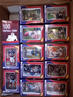 brand new basketball and football cards each pack 100 cards