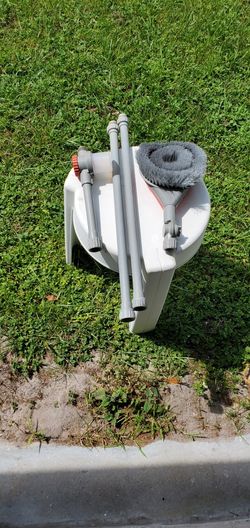 Vintage cleaning brush that attaches to any hose.