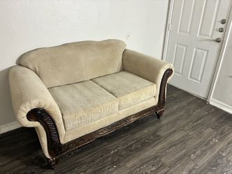 Traditional Loveseat with Carved Wood Frame