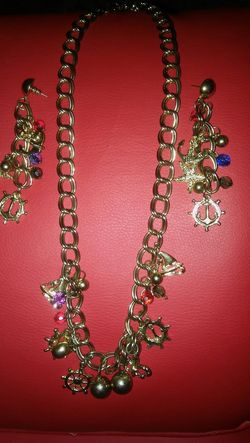 Lovely vintage nautical charm necklace with matching earrings.