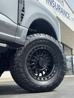 KMC IMS All Black 20” 8x170 W/ 37” Toyo At3 Wheel Package