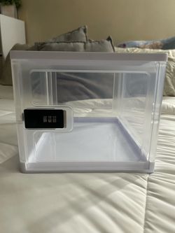 Clear lockable storage box