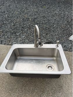 Kitchen sink with faucet