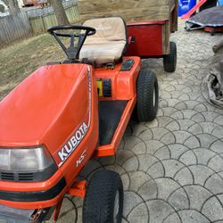 Kubota oHV T1700X 54” CUT RIDING MOWER WITH DUMP CART. 