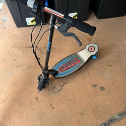 Razor Power Core E100 Electric Scooter for Kids Ages 8+ - 100w Hub Motor, 8" Pneumatic Tire, Up to 11 mph and 60 min Ride Time, for Riders up to 120 l