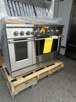 Fisher & Paykel 48” Gas Stove And Thermador Hood 