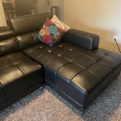 Black Leather Two Piece Sectional $900