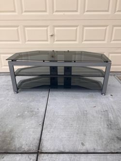 TV Stand in Tempered Glass  and Steel