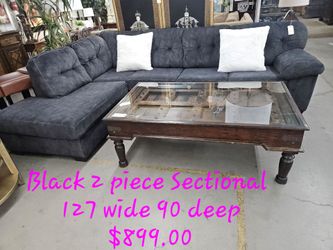 Sectional Black w/chaiseWe are located at 2811 East Bell road. Another Time Around Furniture.