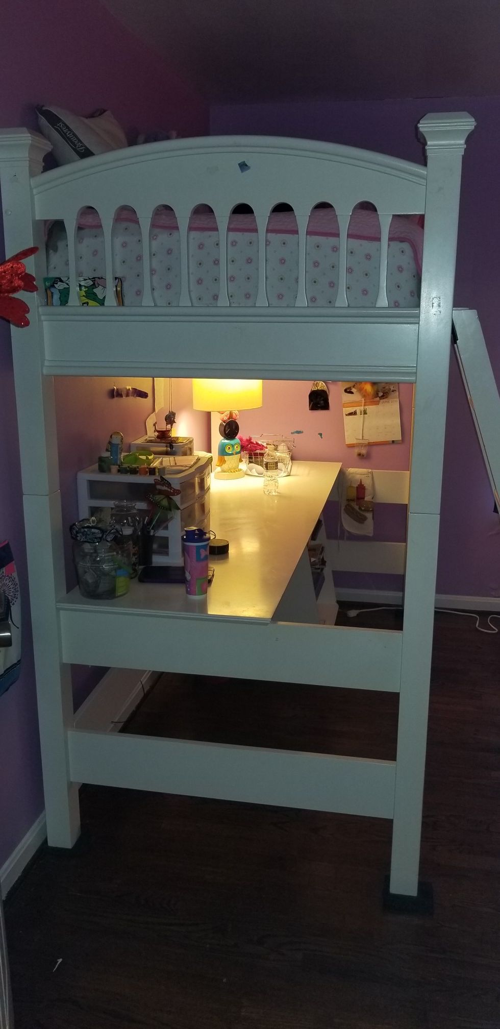 Bunkbed with attached desk and cabinet