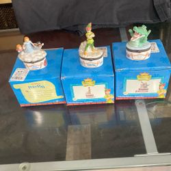 Three Peter Pan trinket boxes