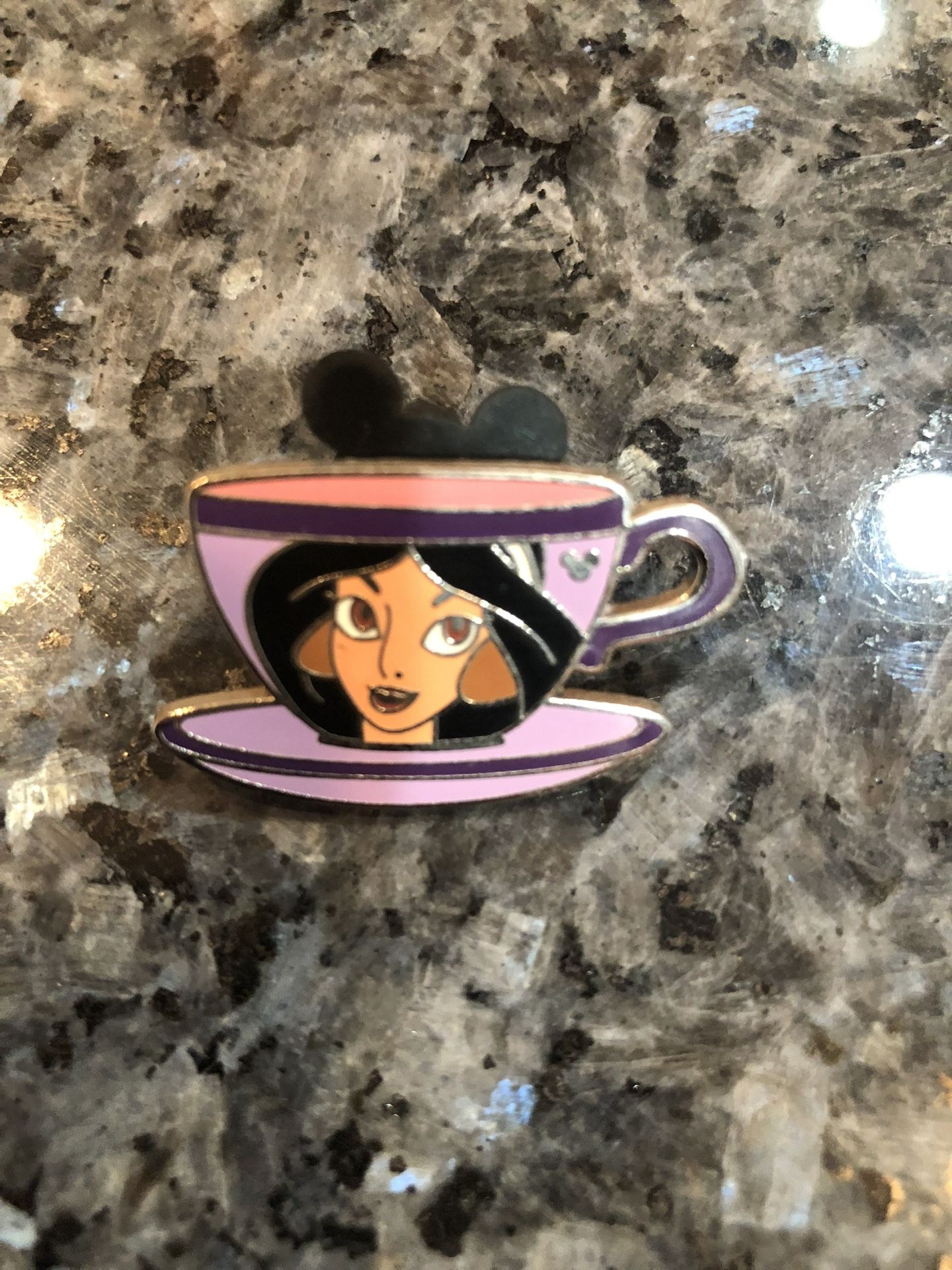 Collectible Disney Jasmine Teacup Mystery Pin. Size 1 1/4 inches wide and 1 inches long. Purchased at Disneyland. Has been on display in a cabinet w