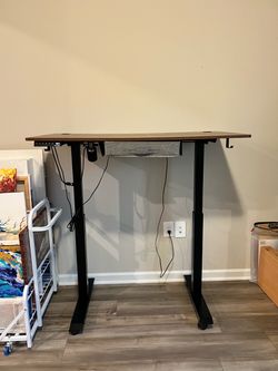 FEZIBO 48" x 24" Electric Standing Desk – Rustic Brown, Drawer, Memory Presets, Wheels