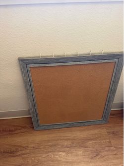framed cork bulletin board with built-in hanging hooks