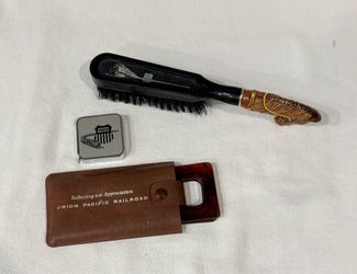 Union Pacific Railroad appreciation gift featuring a brush, tape measure, and a comb & mirror set all with the Union Pacific Logo.