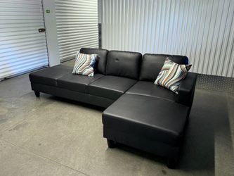 New Faux Leather Sectional 2 pieces- Delivery Available