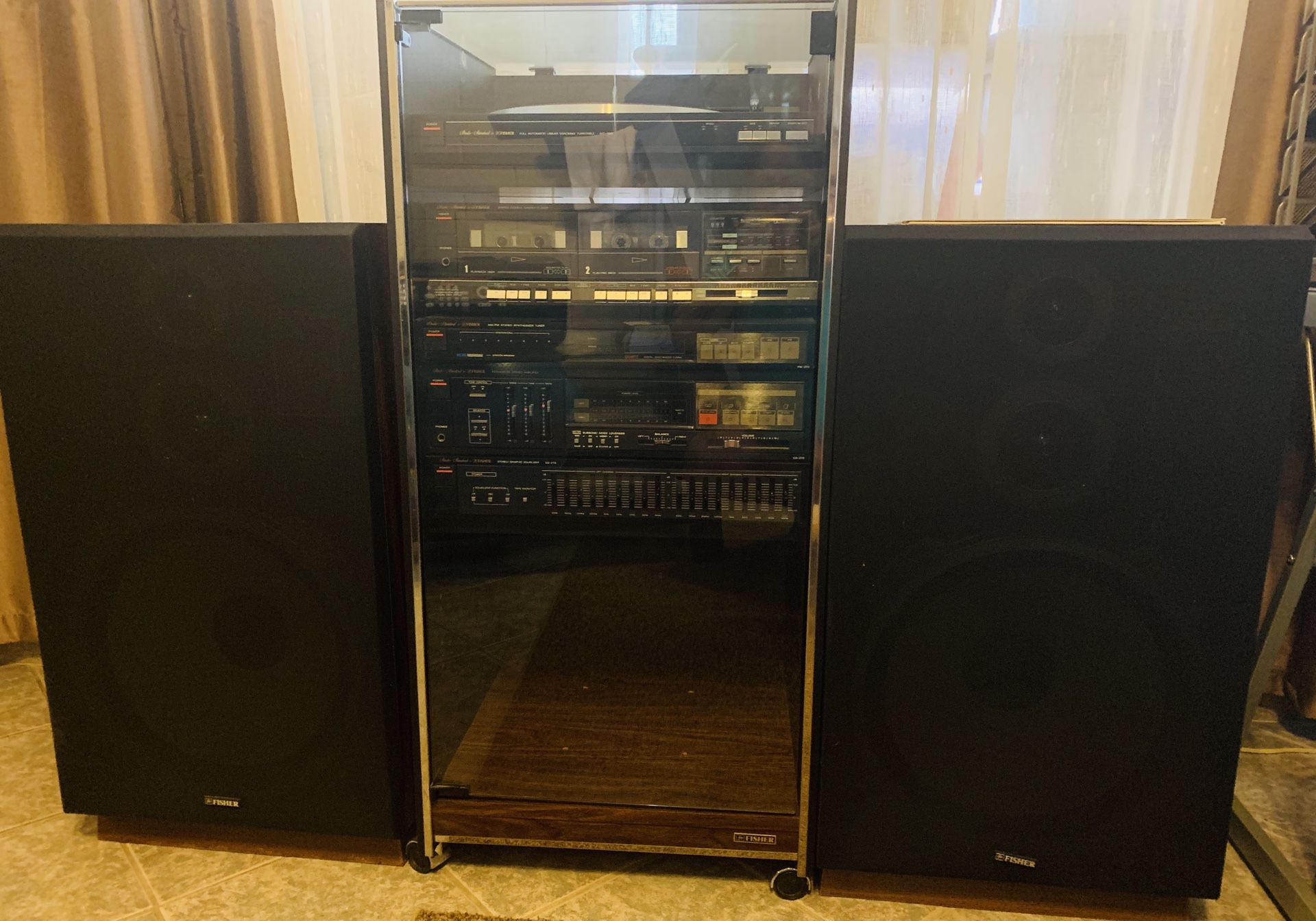 Fisher standard signature stereo system w/2 speakers & cabinet